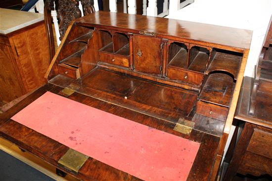 An early 18th century walnut and featherbanded bureau, W.3ft